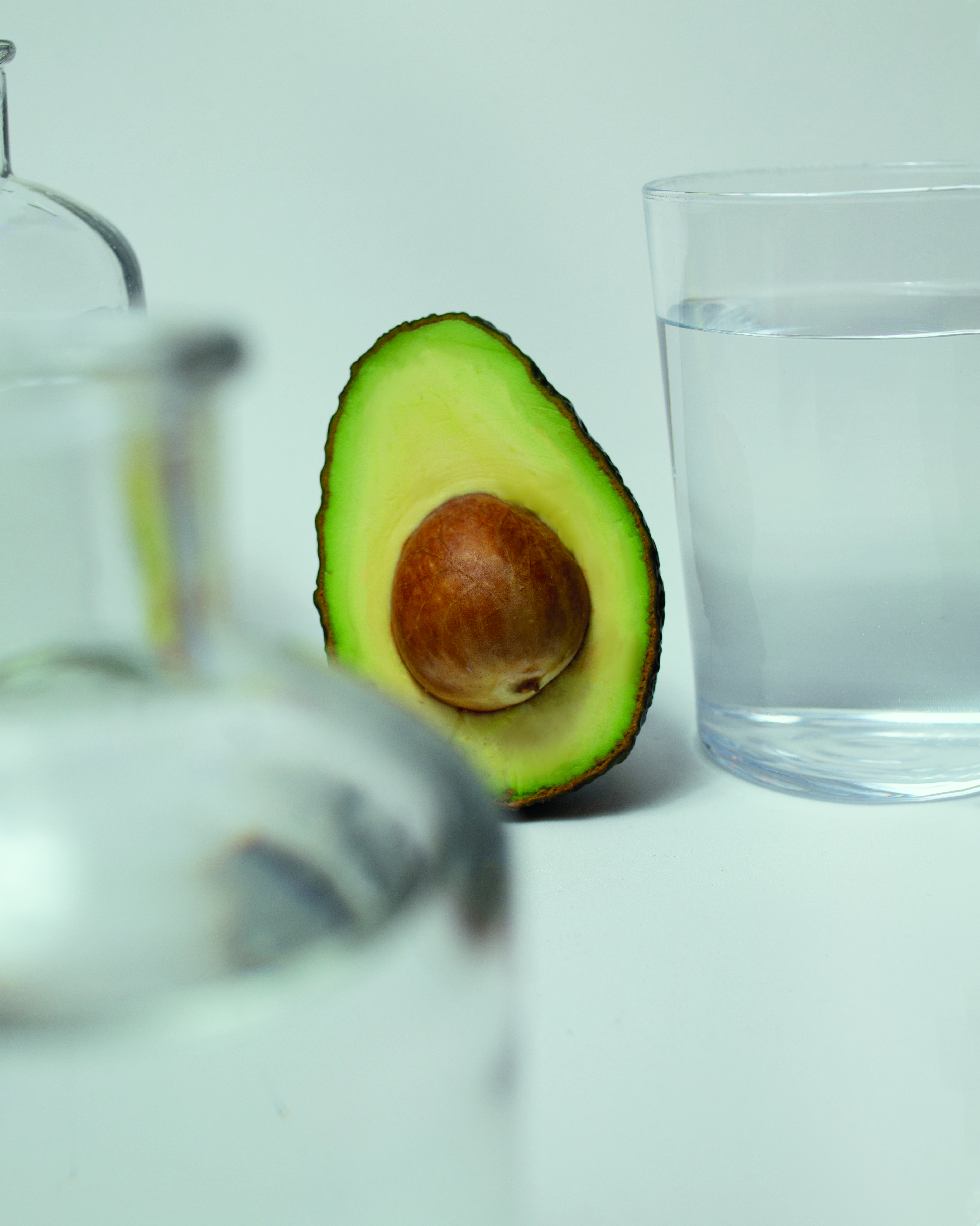 Fresh olive oil falling slowly onto warm bread torn by hand